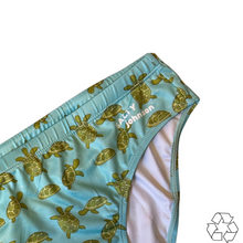 Load image into Gallery viewer, Salty Johnson AU sustainable mens swim briefs in blue with sea turtle pattern
