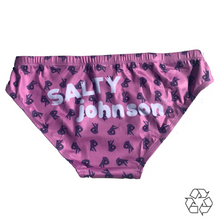 Load image into Gallery viewer, Sustainable mens swim briefs by Salty Johnson AU in purple with black symbols and white logo