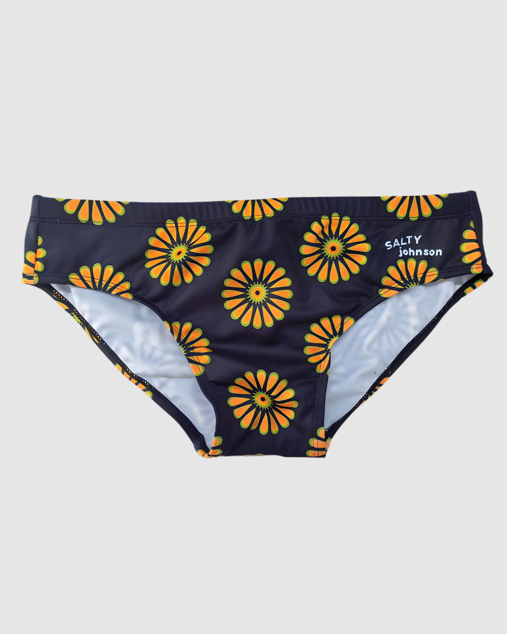 Retro Bloom floral print mens swim briefs in recycled REPREVE fabric, Salty Johnson