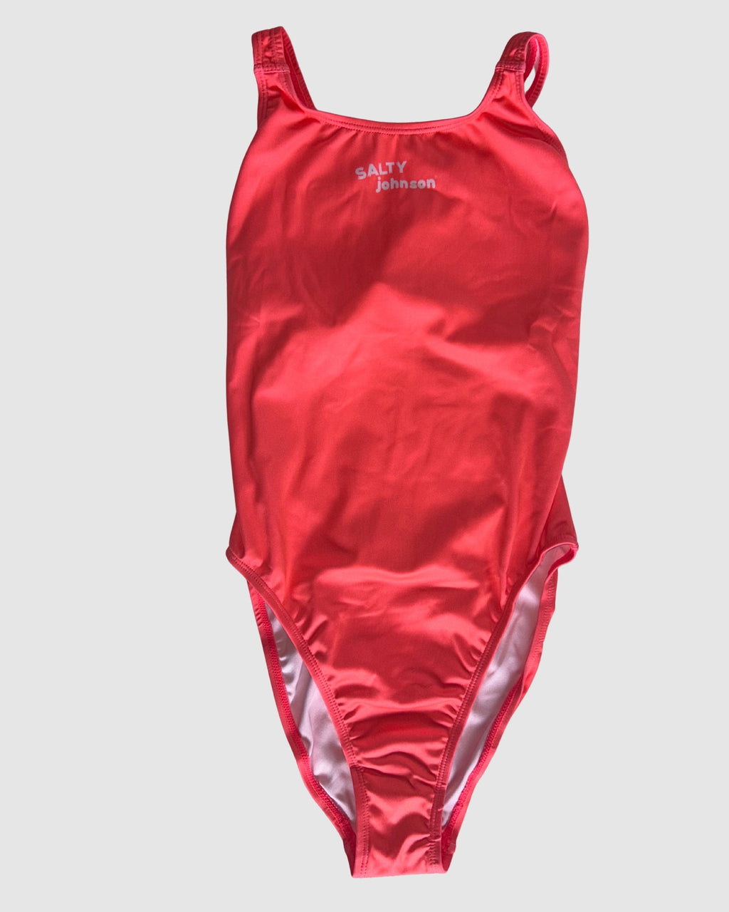 Front view of Classics Watermelon women's thick strap one-piece swimsuit, solid watermelon red.