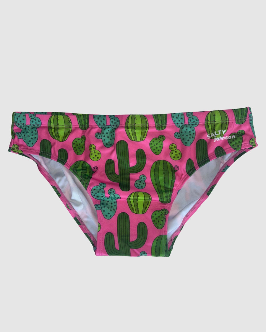 Front view of Salty Johnson Prickly Business Pink men's swim briefs in pink, green.