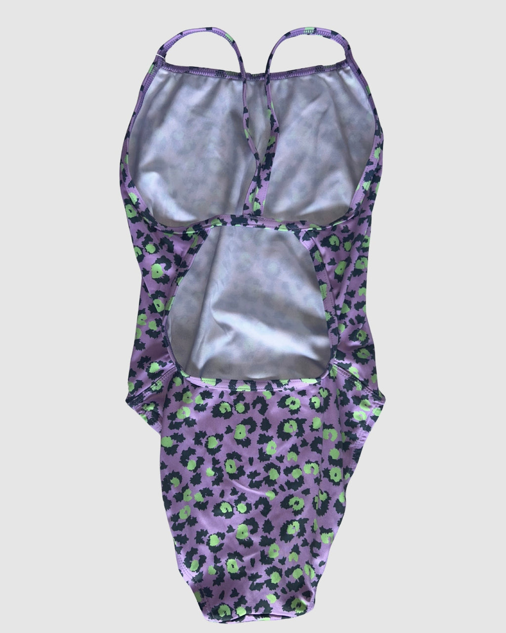 Open cross-back view of Purple Patch women's thin strap one-piece swimsuit, black and lime leopard spots on lilac.