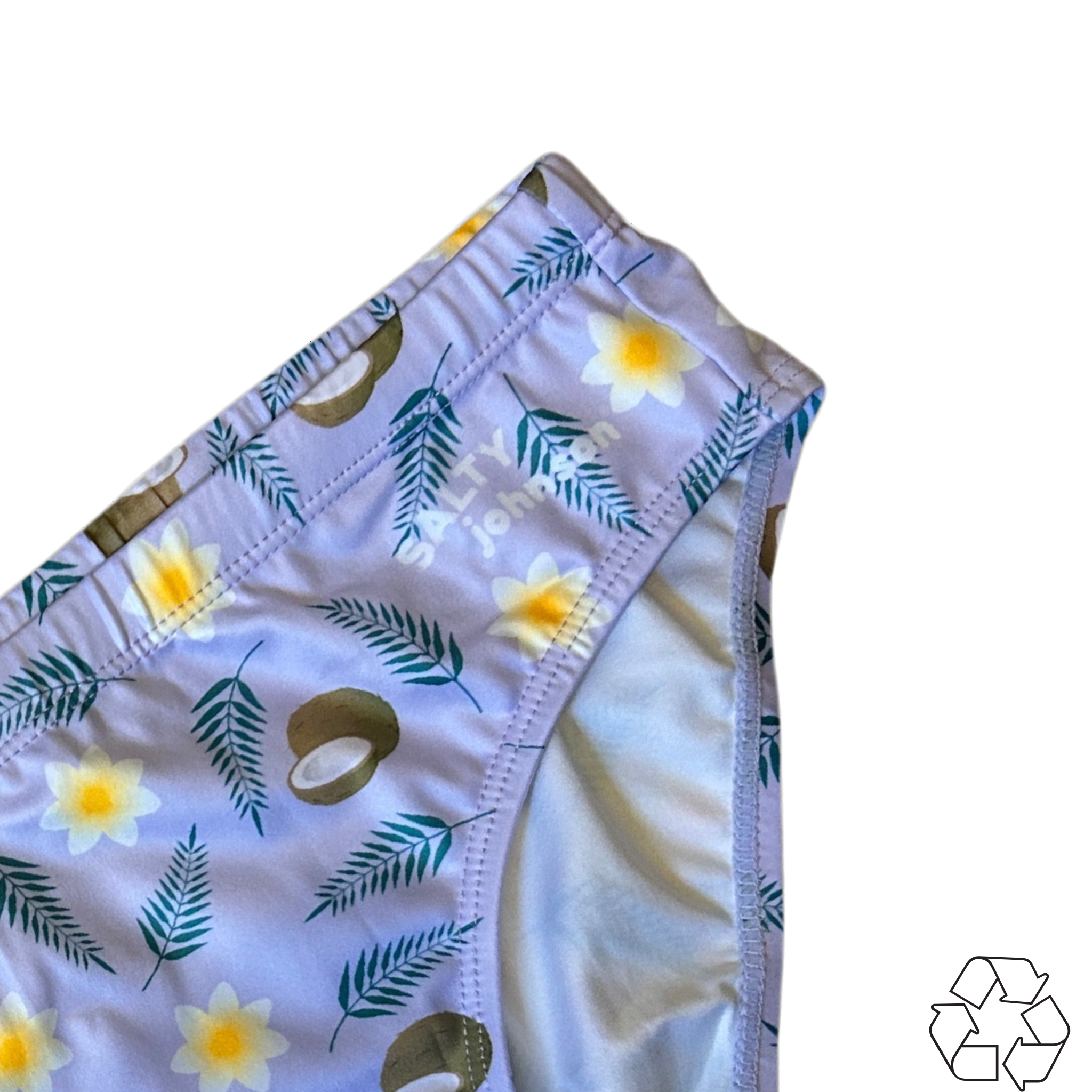 Salty Johnson AU Sustainable Mens Swim Briefs with tropical floral and coconut print in light purple