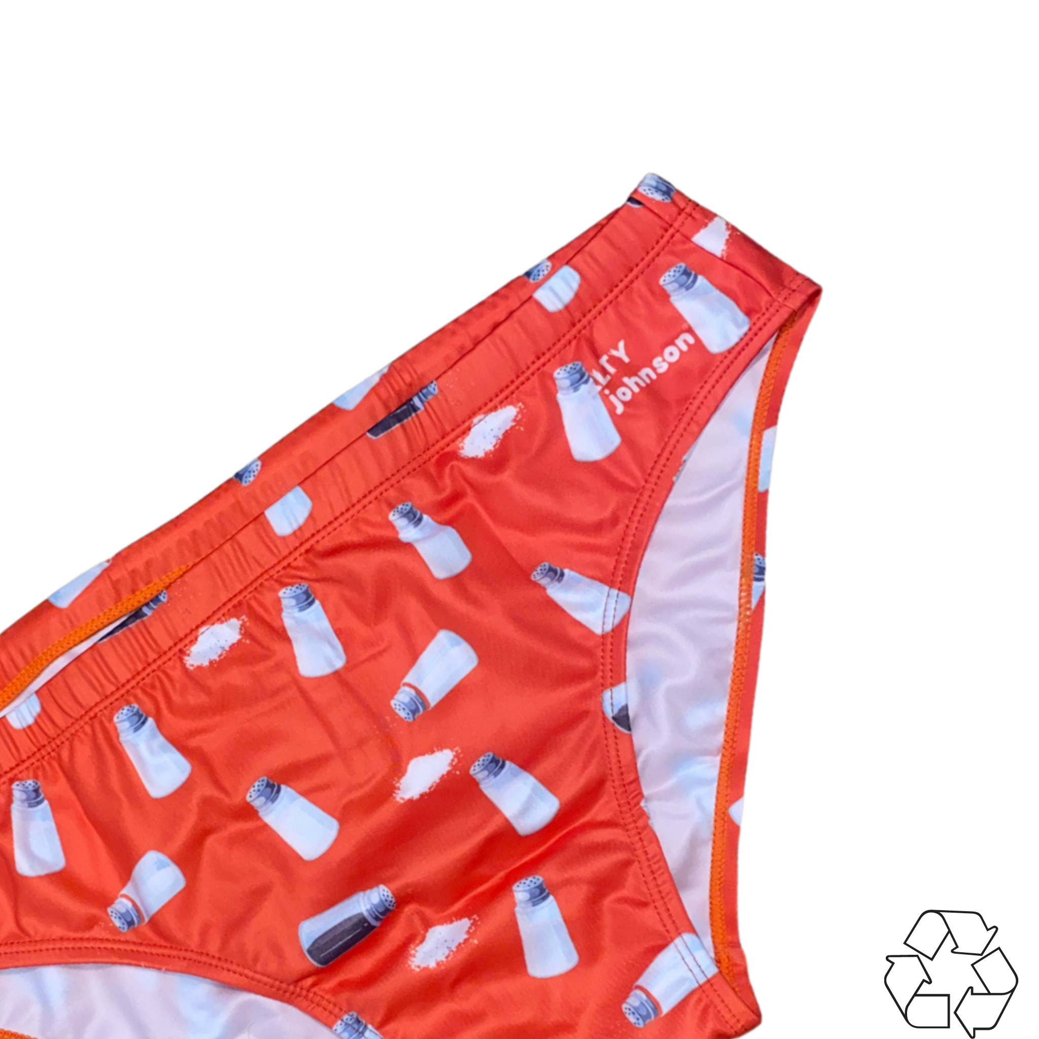 Salty Johnson sustainable mens swim briefs in red with white bottle pattern and logo detail