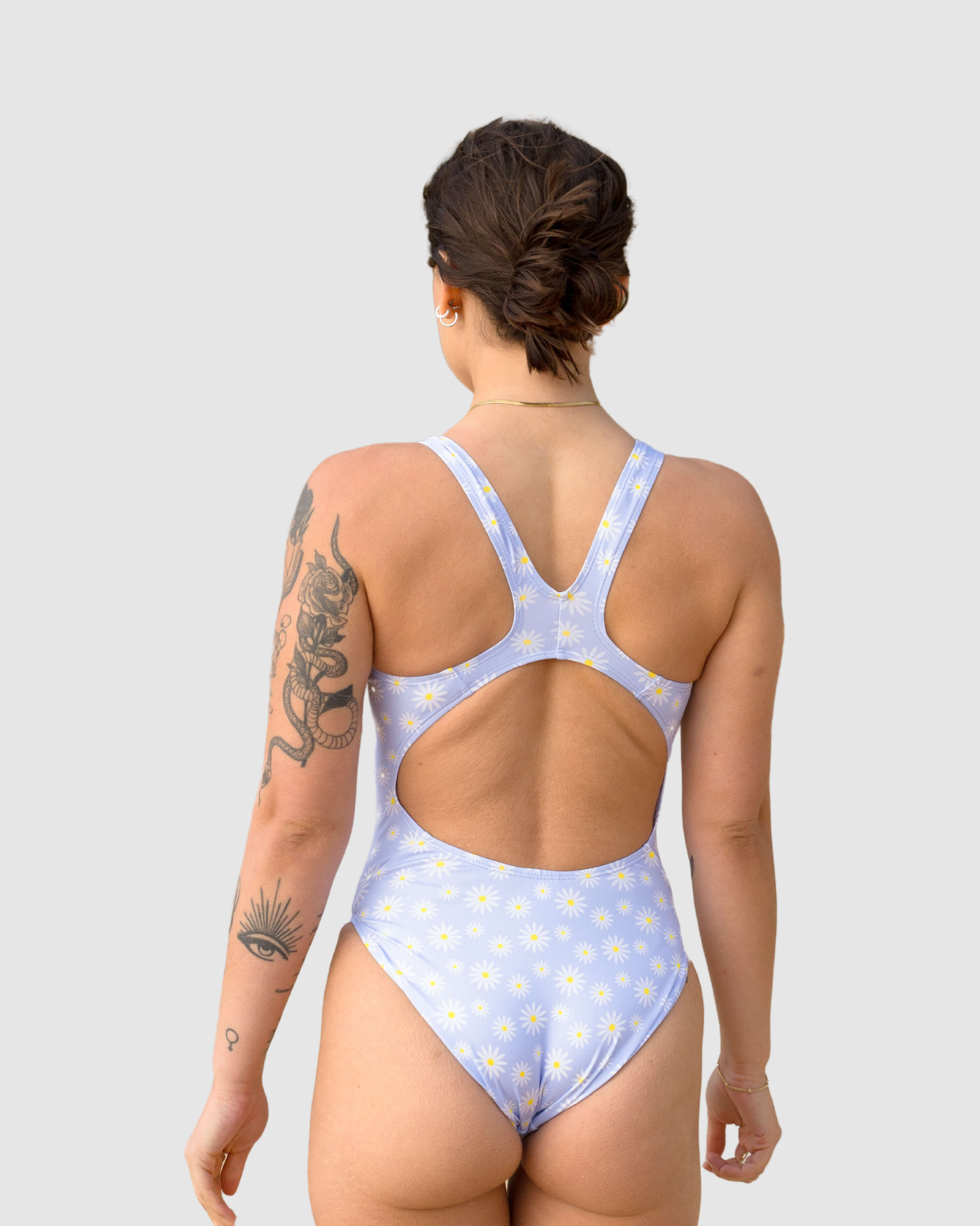 Back view of Salty Johnson AU sustainable womens one piece swimsuit with a floral design