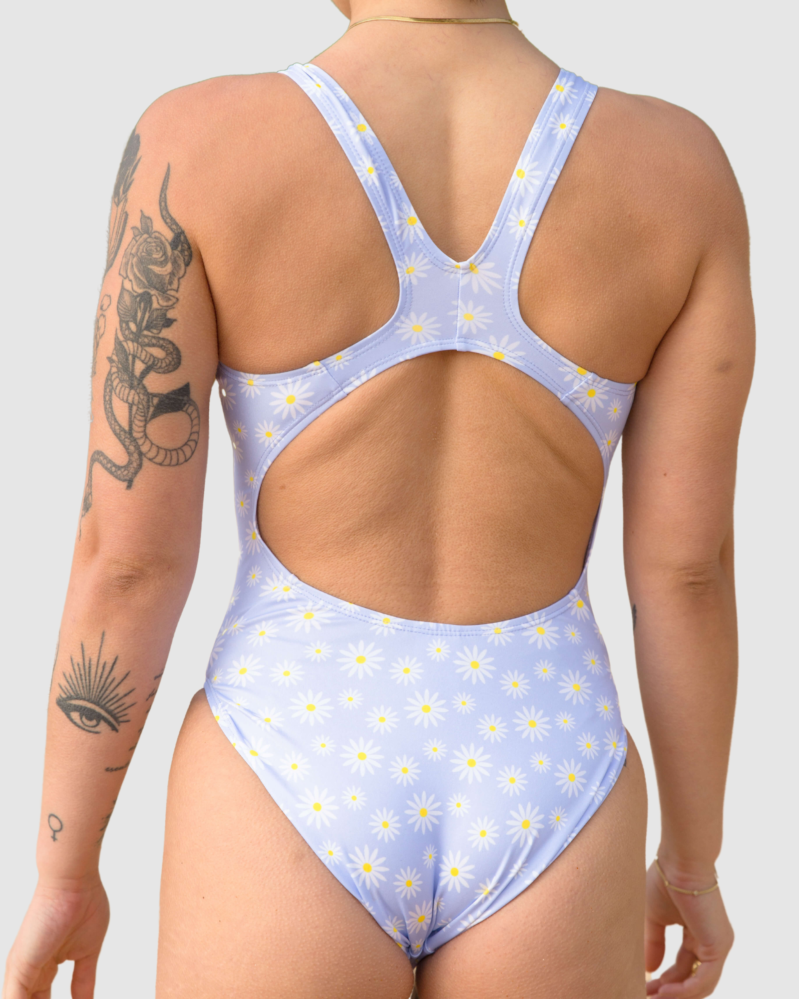 Back view of a sustainable womens one piece swimsuit by Salty Johnson AU with a floral design